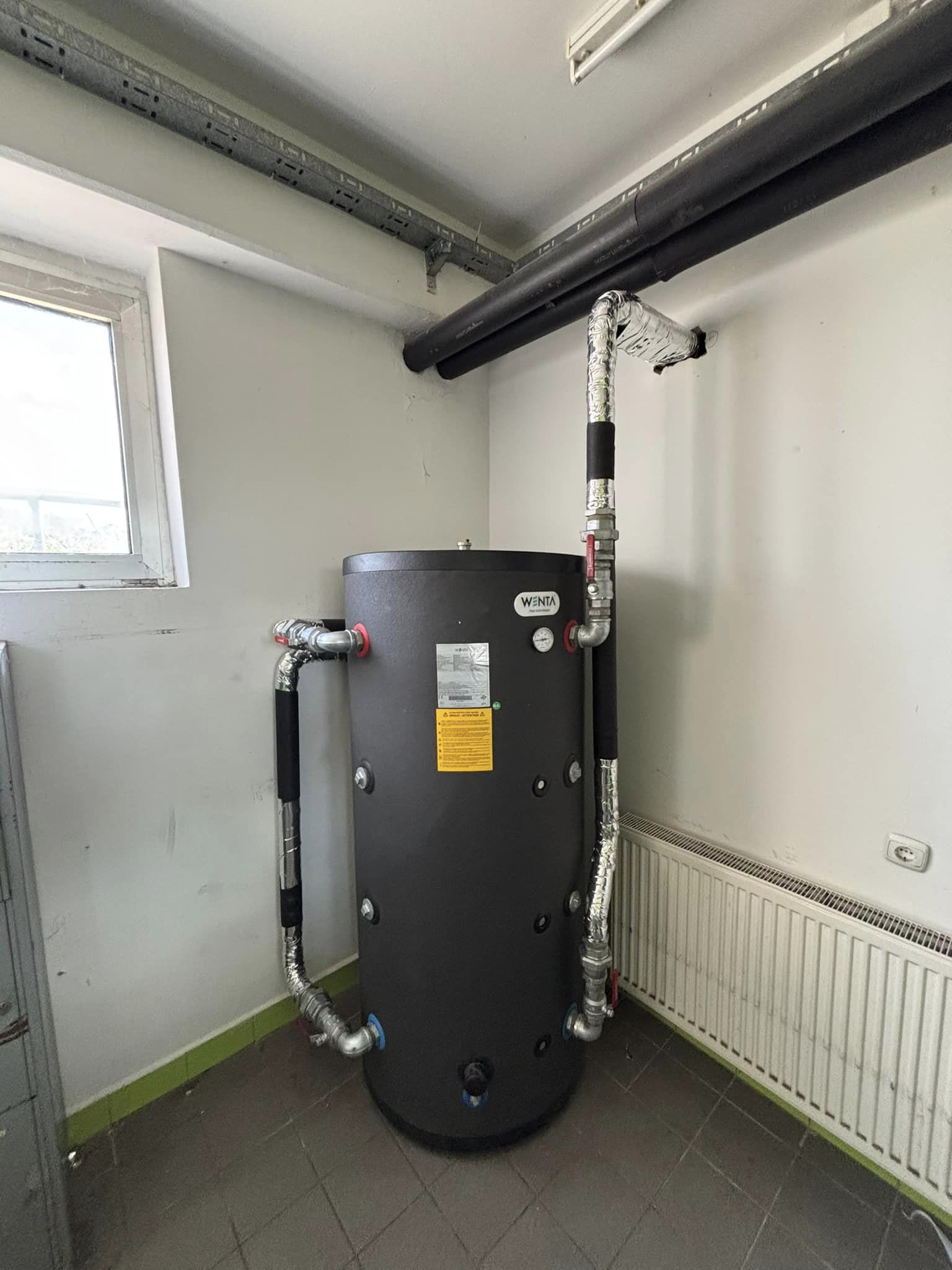 Încălzitor integrat de apă cu pompă de căldură